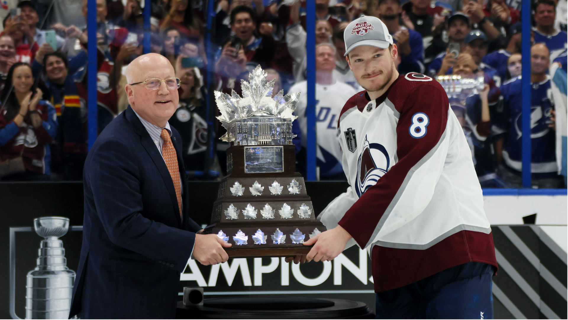 Cale Makar being presented with the Conn Smythe Trophy for most valuable player of the postseason