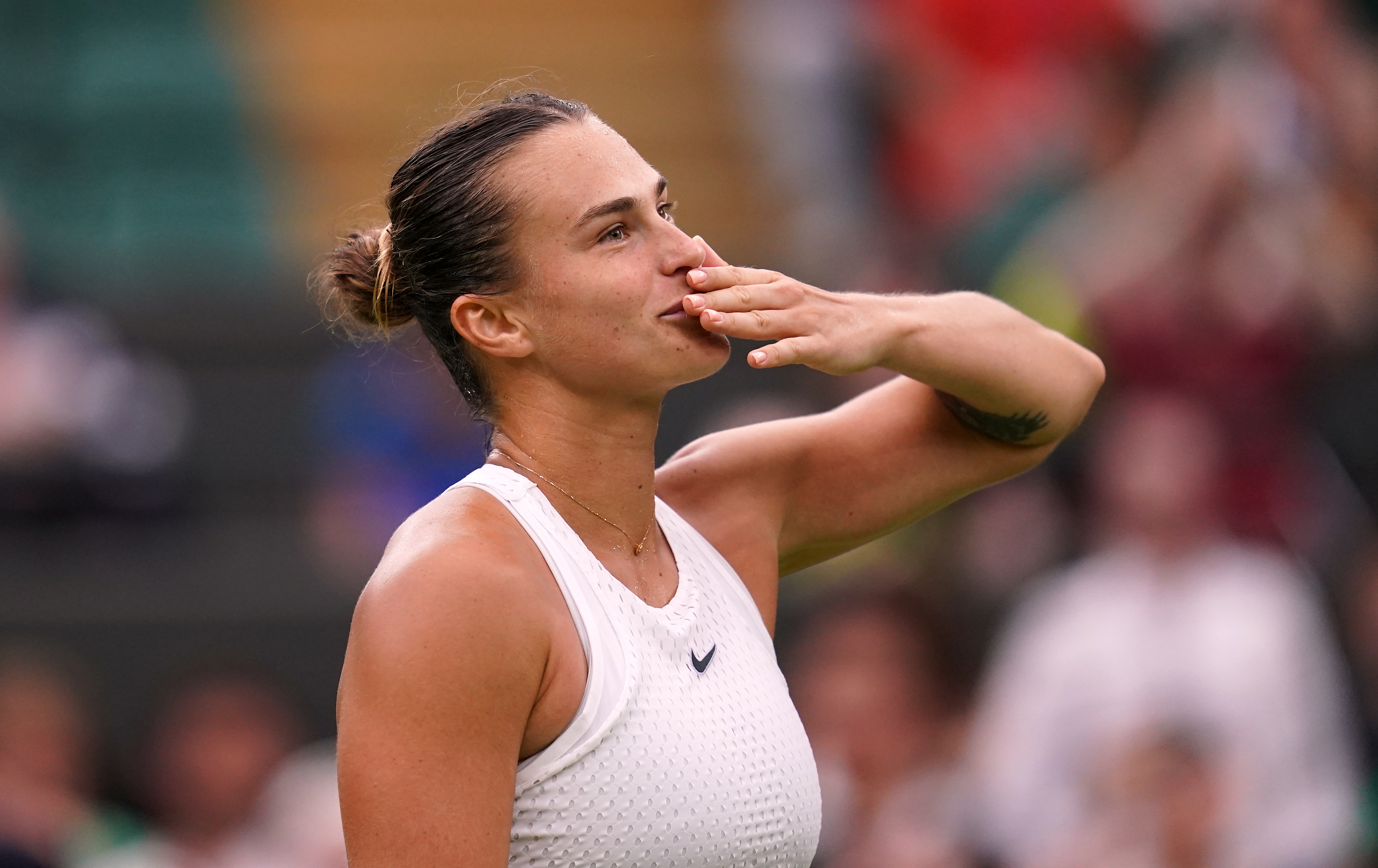 Aryna Sabalenka celebrates beating Anna Blinkova