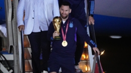 Lionel Messi finally got his hands on the World Cup trophy on Sunday