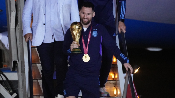 Lionel Messi finally got his hands on the World Cup trophy on Sunday
