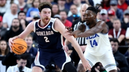 Gonzaga's Drew Timme battles in the post against UCLA's Kenneth Nwuba
