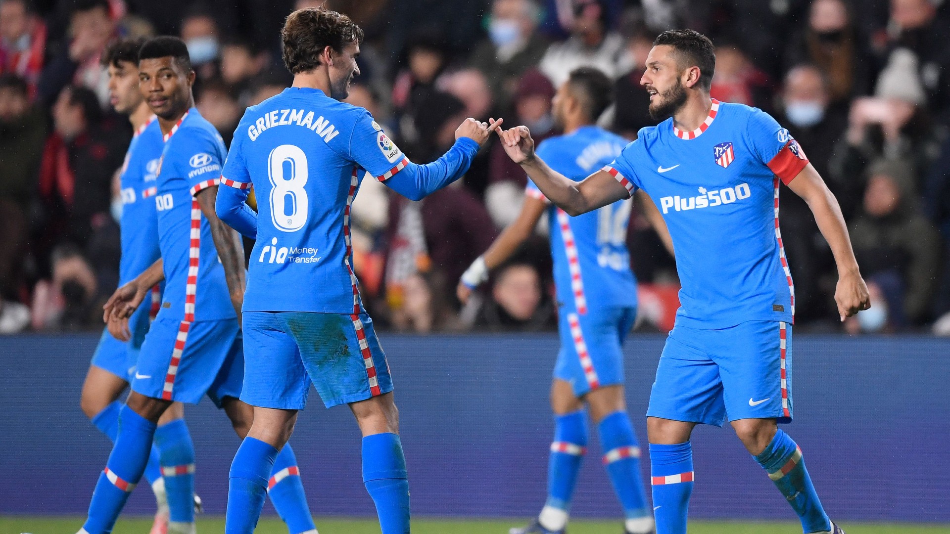 Koke celebrates scoring Atletico Madrid's opening goal against Rayo Vallecano.