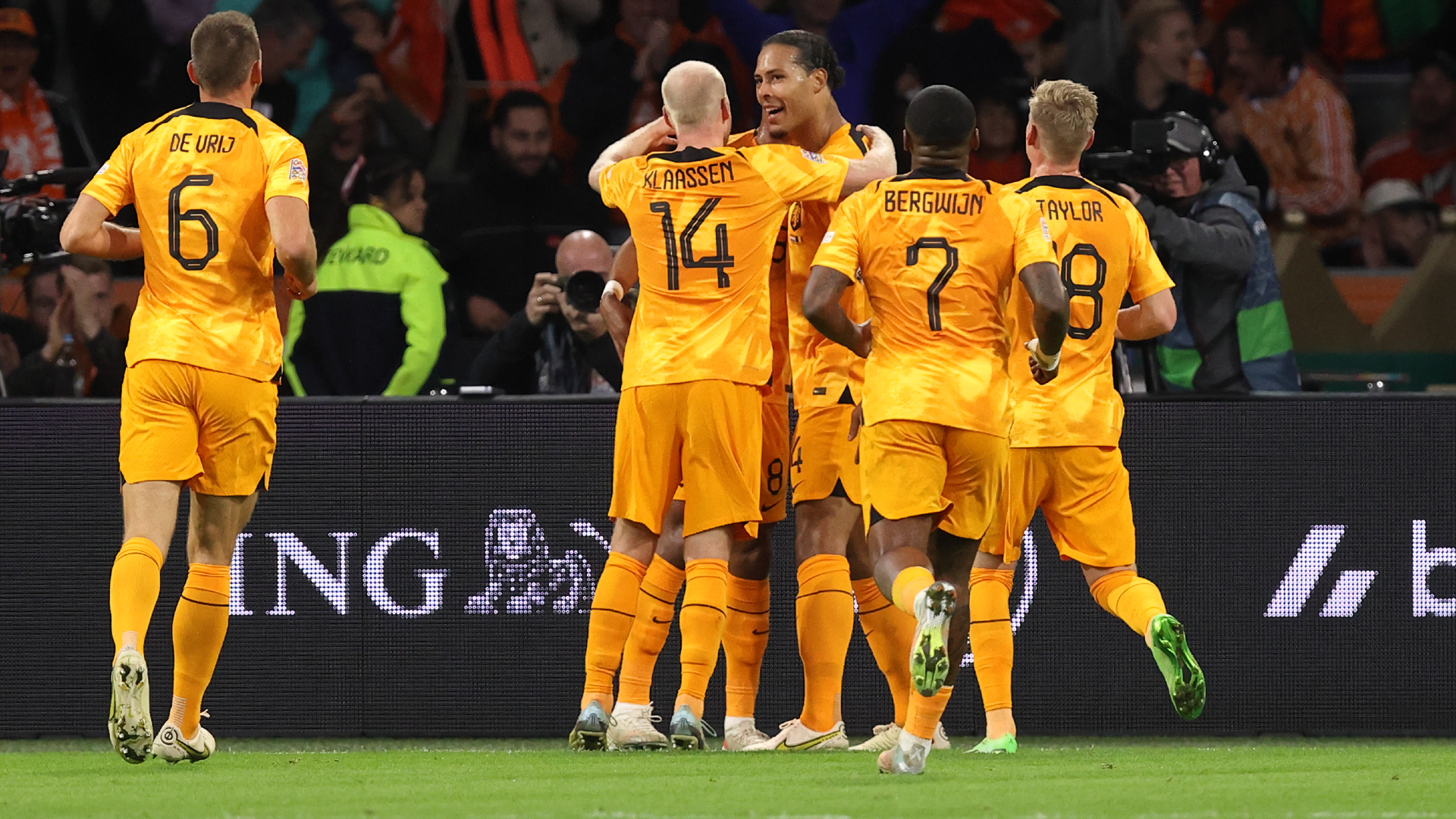 Netherlands players celebrate Virgil van Dijk's goal against Belgium