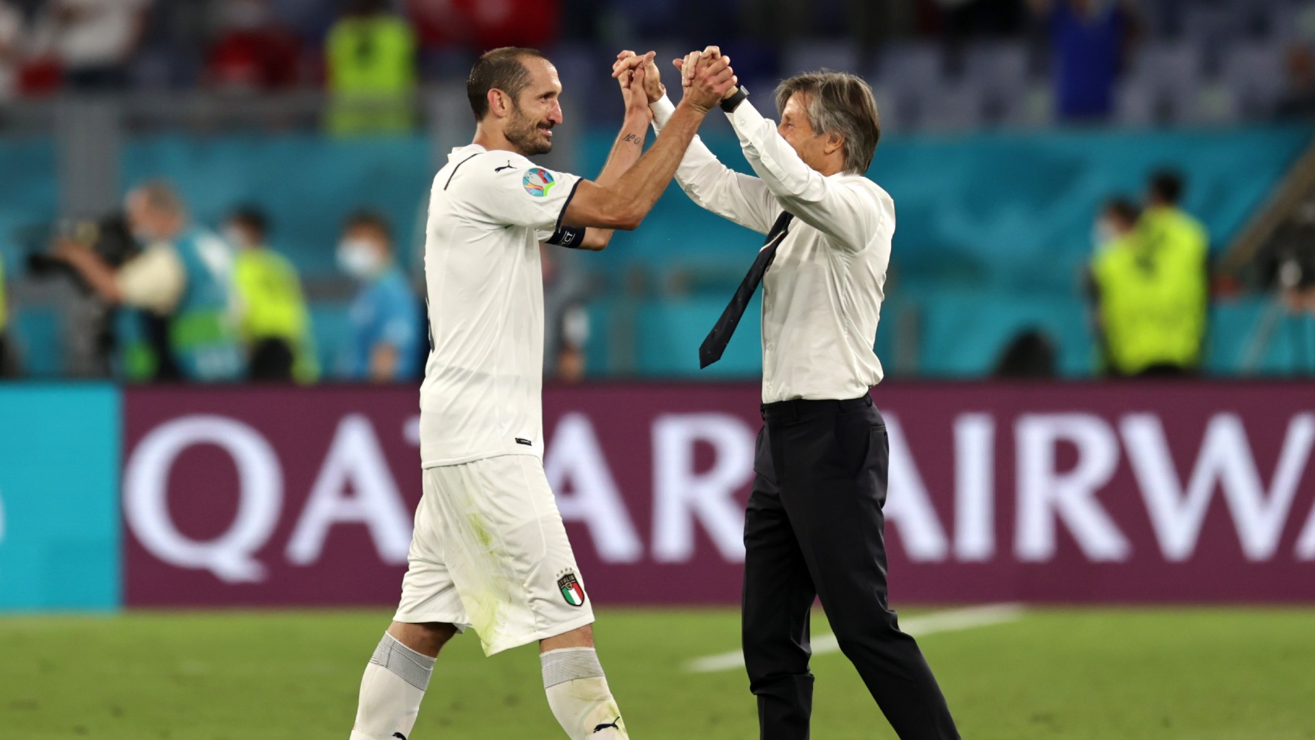 Giorgio Chiellini and Roberto Mancini celebrate at Euro 2020 with Italy