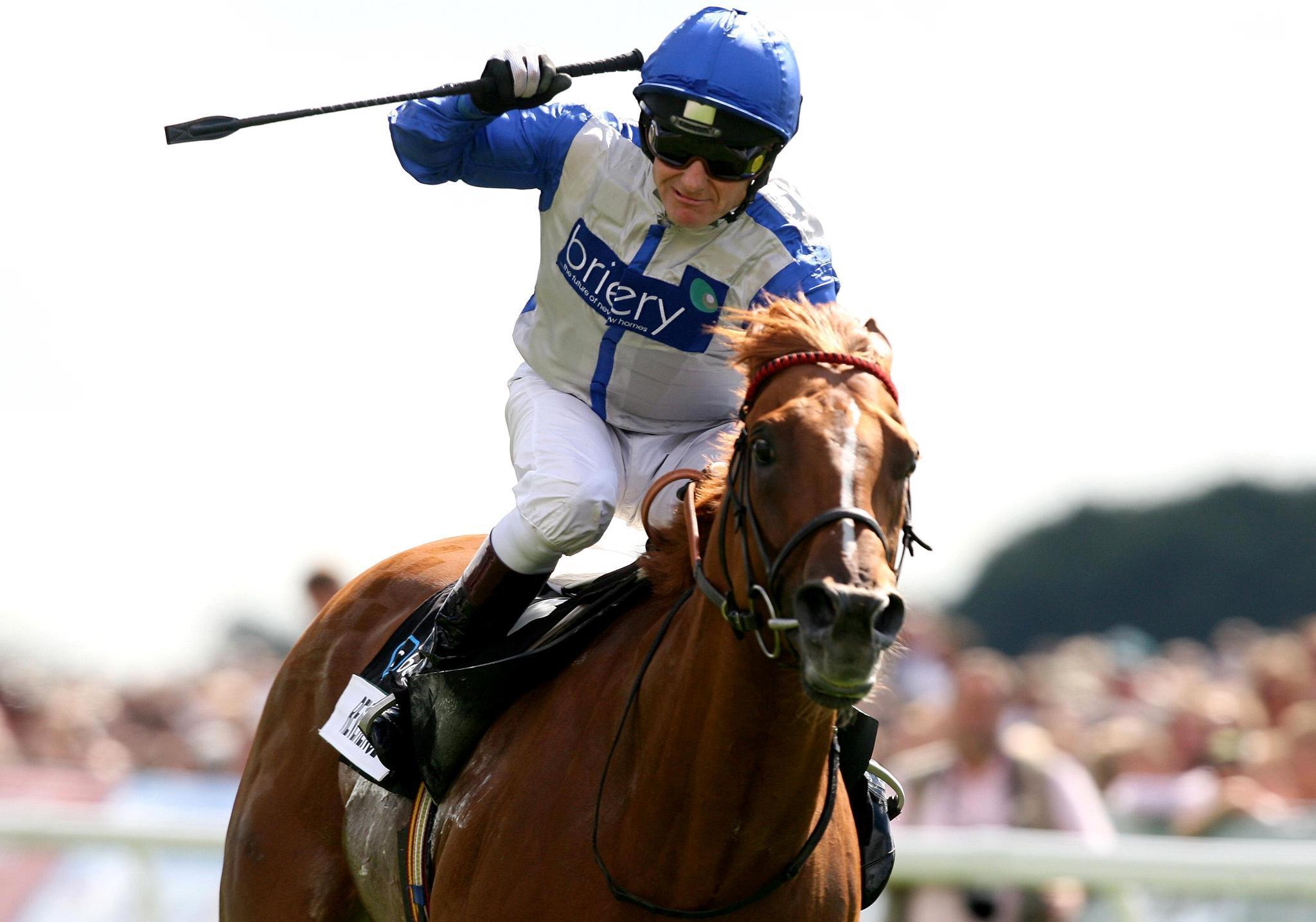 Kevin Darley celebrates winning the Nunthorpe on Reverence