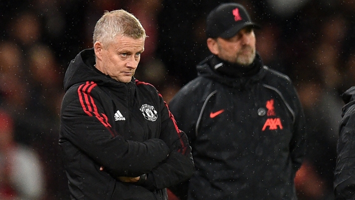 Ole Gunnar Solskjaer (L) and Jurgen Klopp (R) during the Manchester United-Liverpool clash