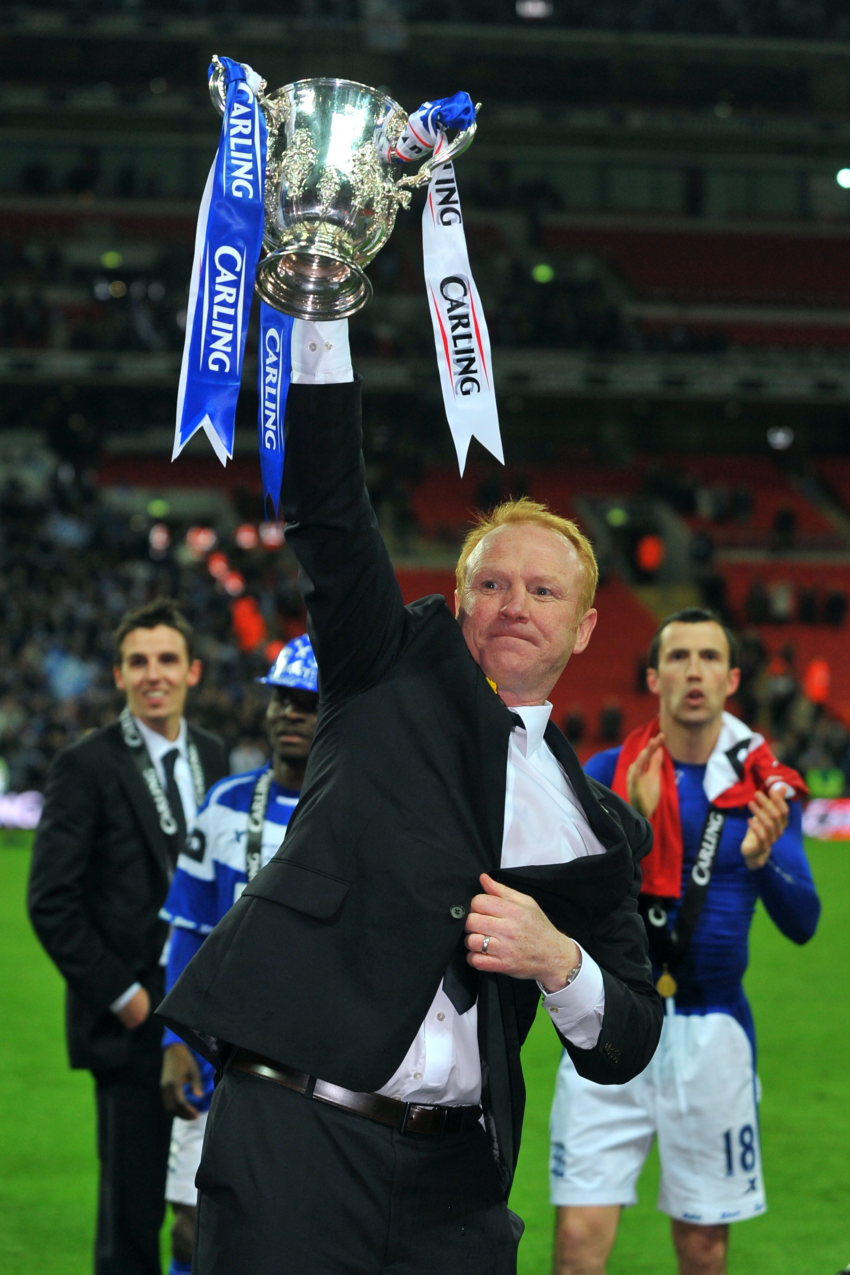 Alex McLeish lifts the League Cup trophy in 2011