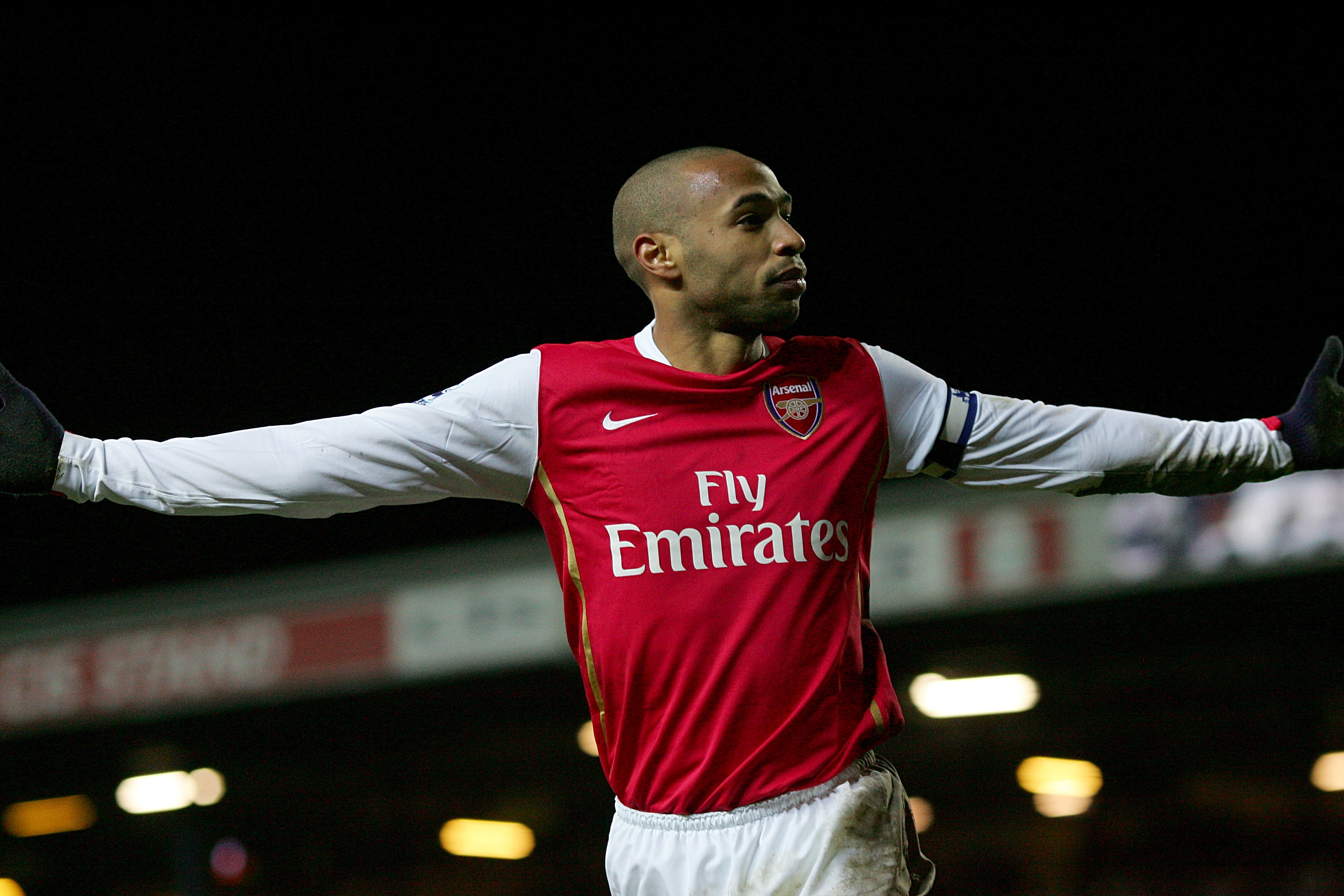 Thierry Henry celebrates after scoring for Arsenal against Blackburn