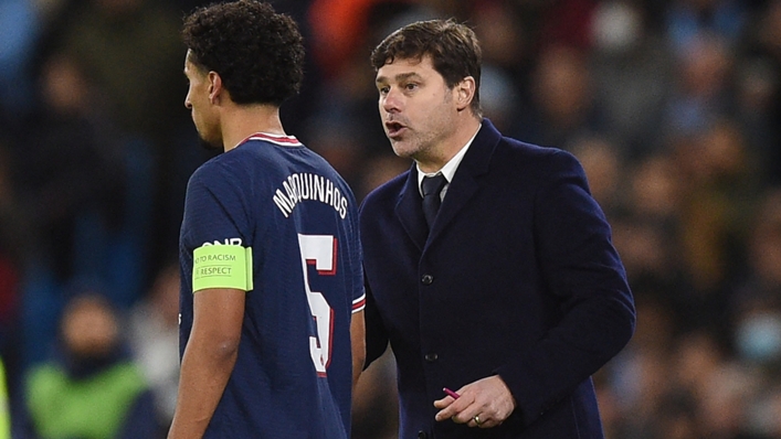 Mauricio Pochettino (R) has been linked with Manchester United