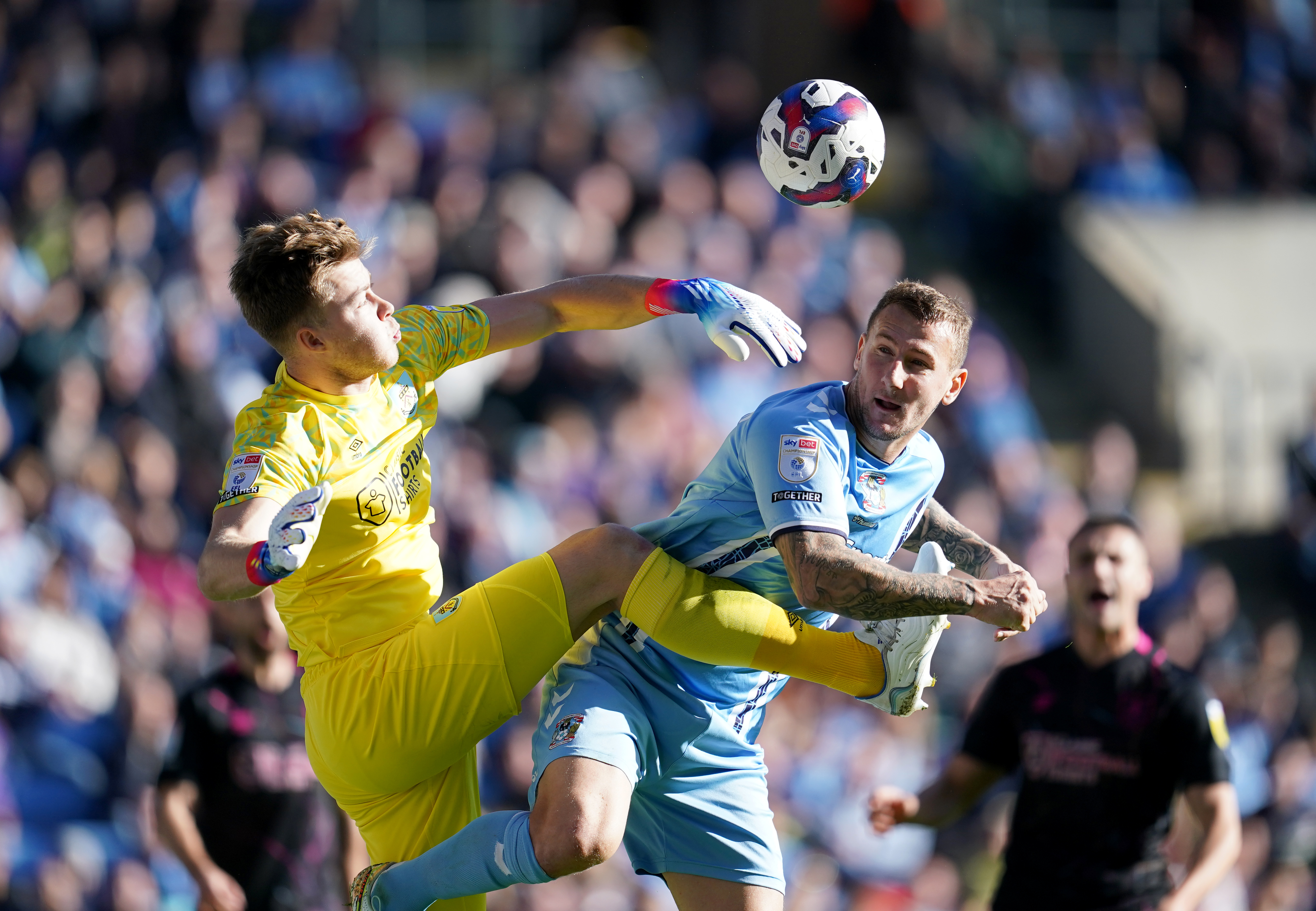 Bailey Peacock-Farrell (left) in action for Burnley
