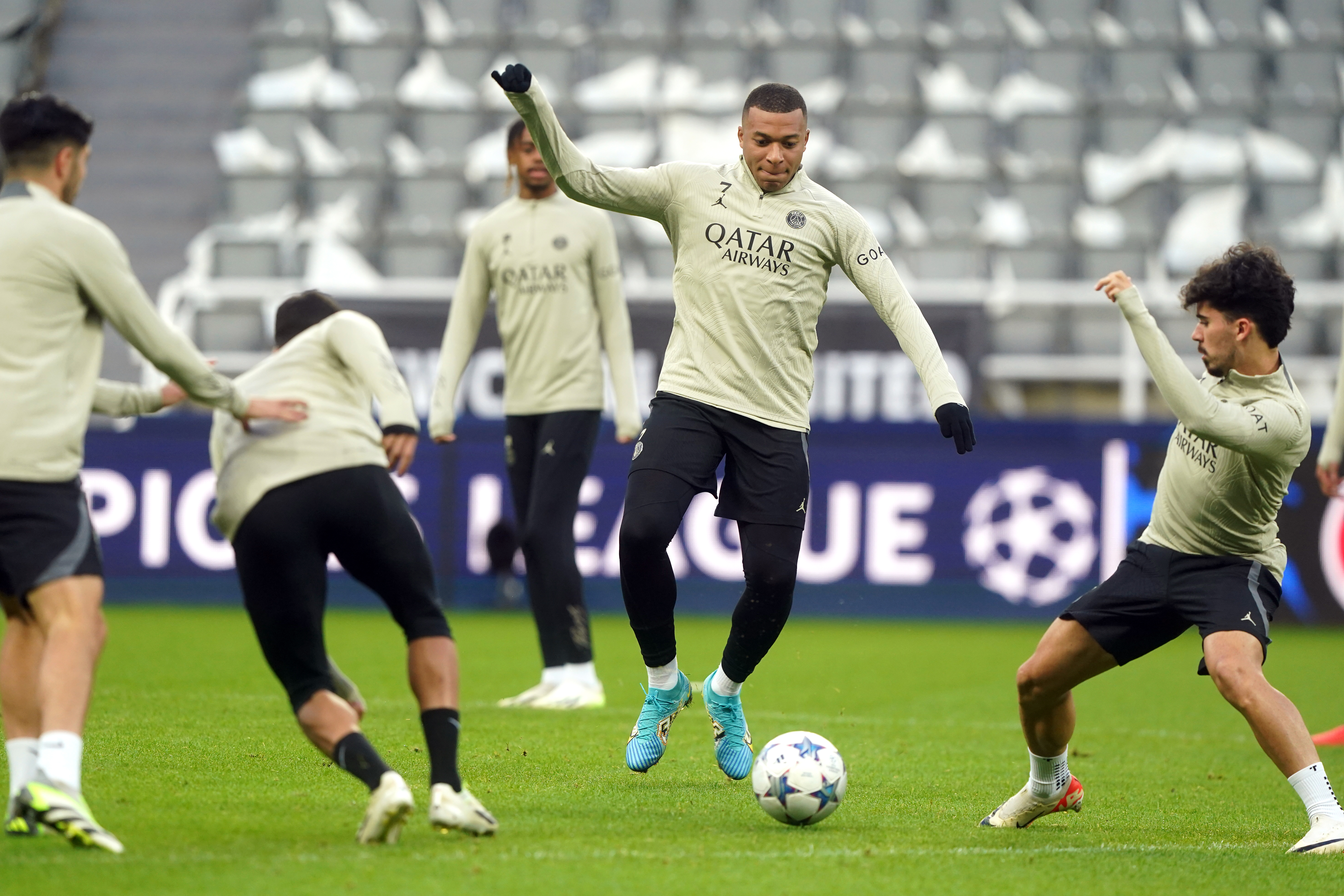 Paris Saint Germain’s Kylian Mbappe (centre) and team-mates during a training session