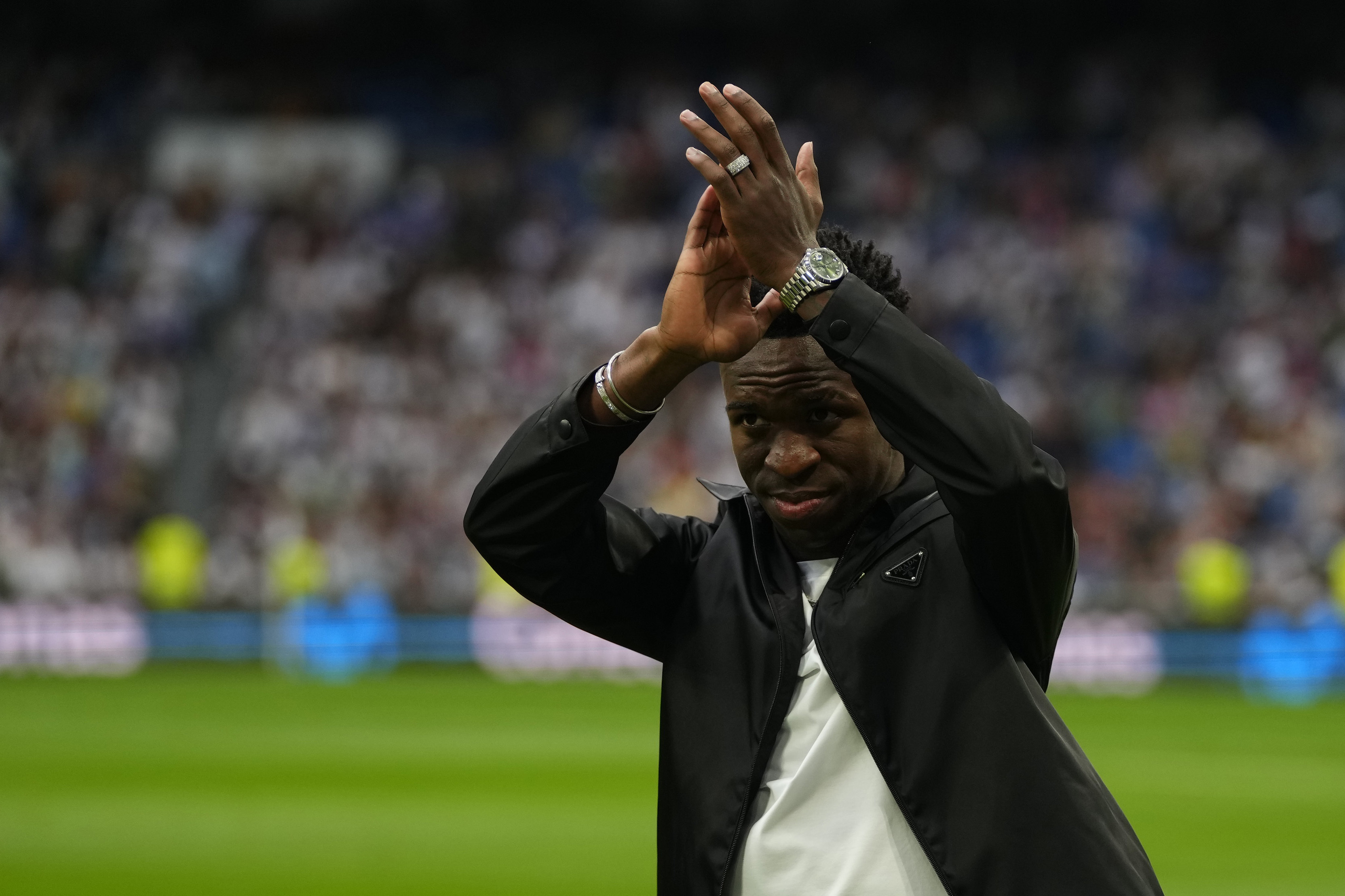 Vinicius Junior applauds Real Madrid fans at the Bernabeu on Wednesday evening