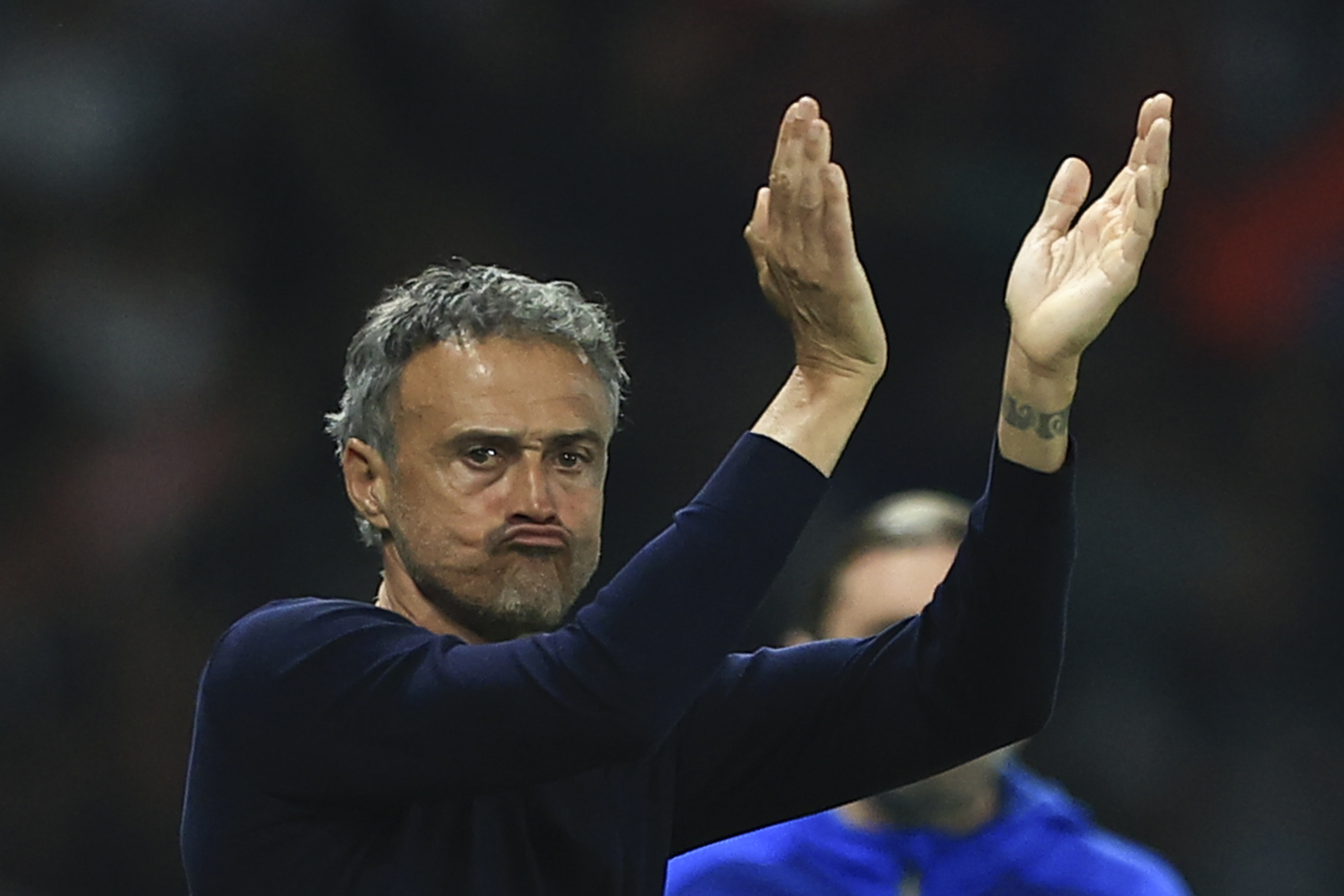 Luis Enrique applauds his players during the win over Marseille