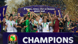 Algerian team celebrate championship with trophy after the 2019 Africa Cup of Nations final match between Senegal and Algeria at the Cairo Stadium in Cairo
