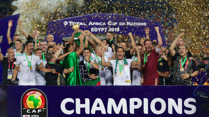 Algerian team celebrate championship with trophy after the 2019 Africa Cup of Nations final match between Senegal and Algeria at the Cairo Stadium in Cairo
