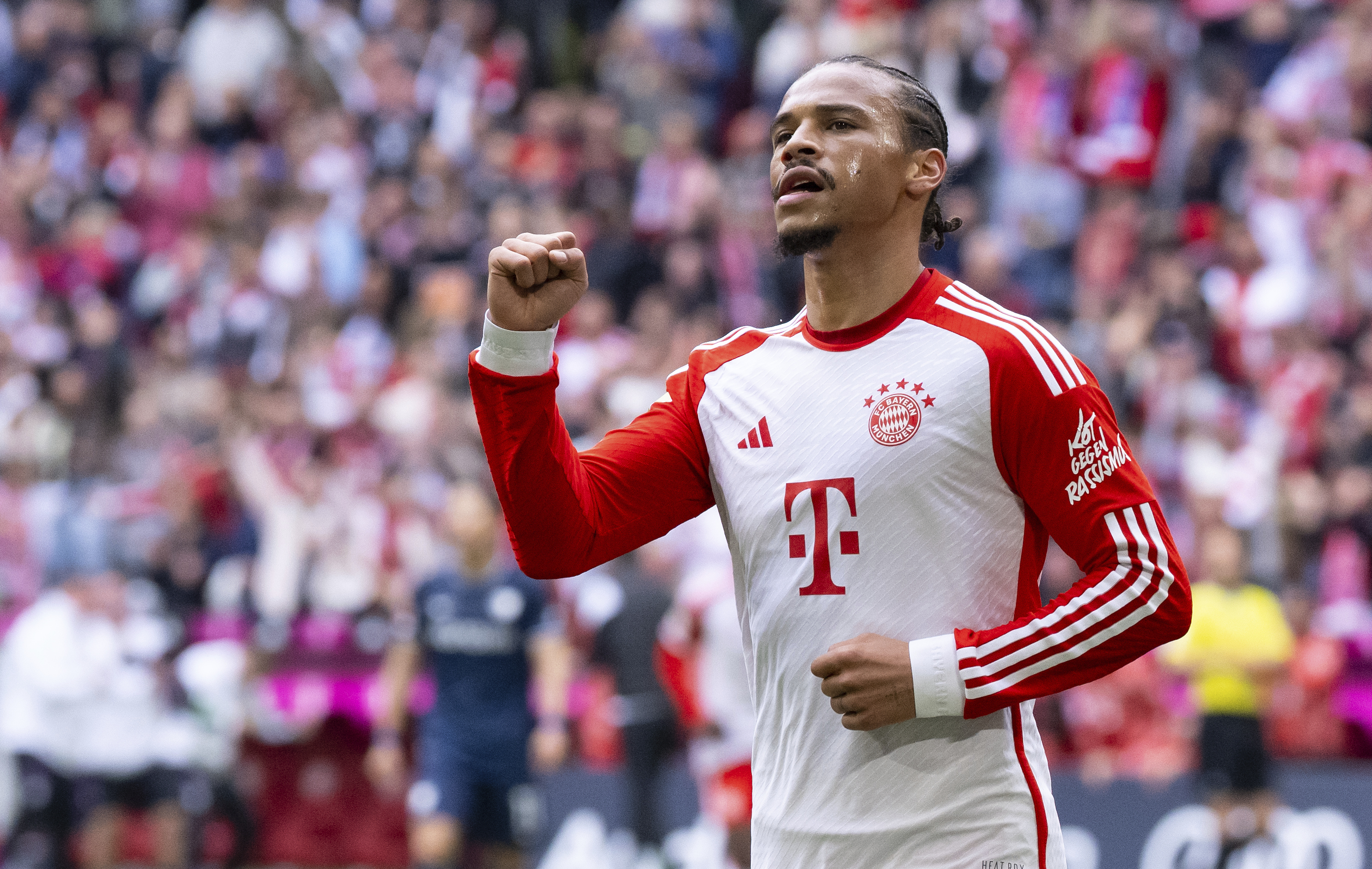 Leroy Sane celebrates scoring Bayern's fourth goal, assisted by Harry Kane, against Bochum last weekend