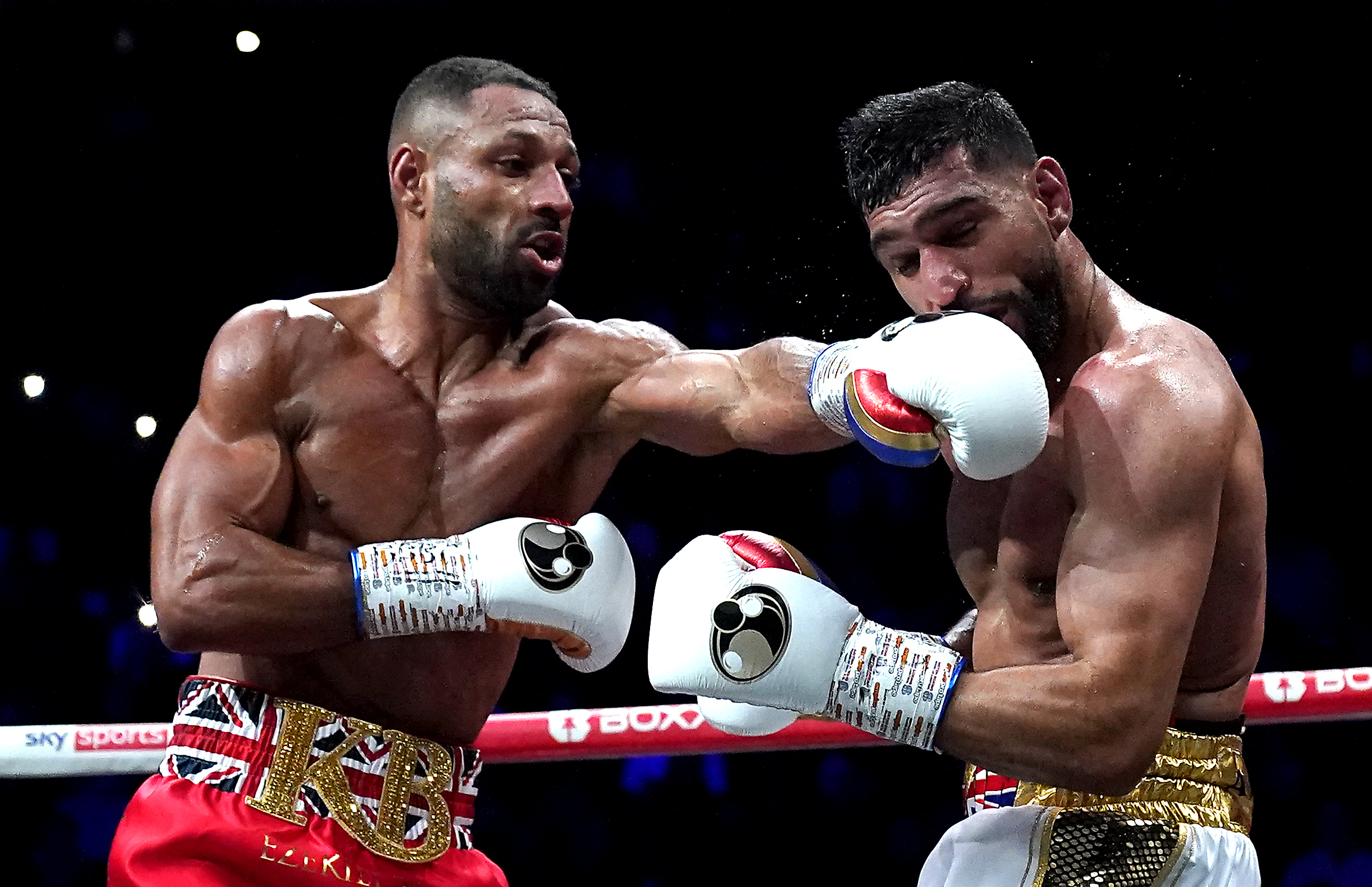 Kell Brook, left, in action against Amir Khan
