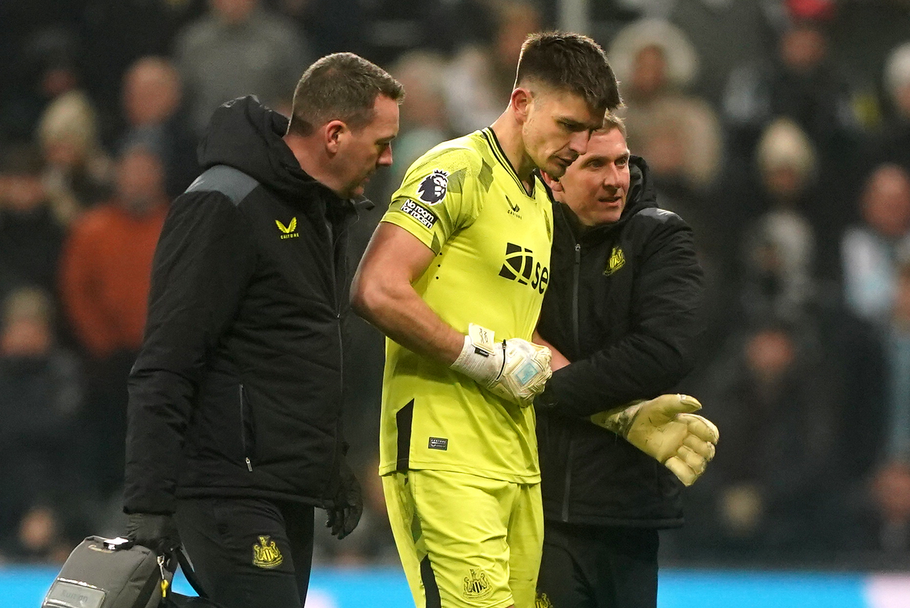 Newcastle keeper Nick Pope (centre) suffered a dislocated shoulder late in the game