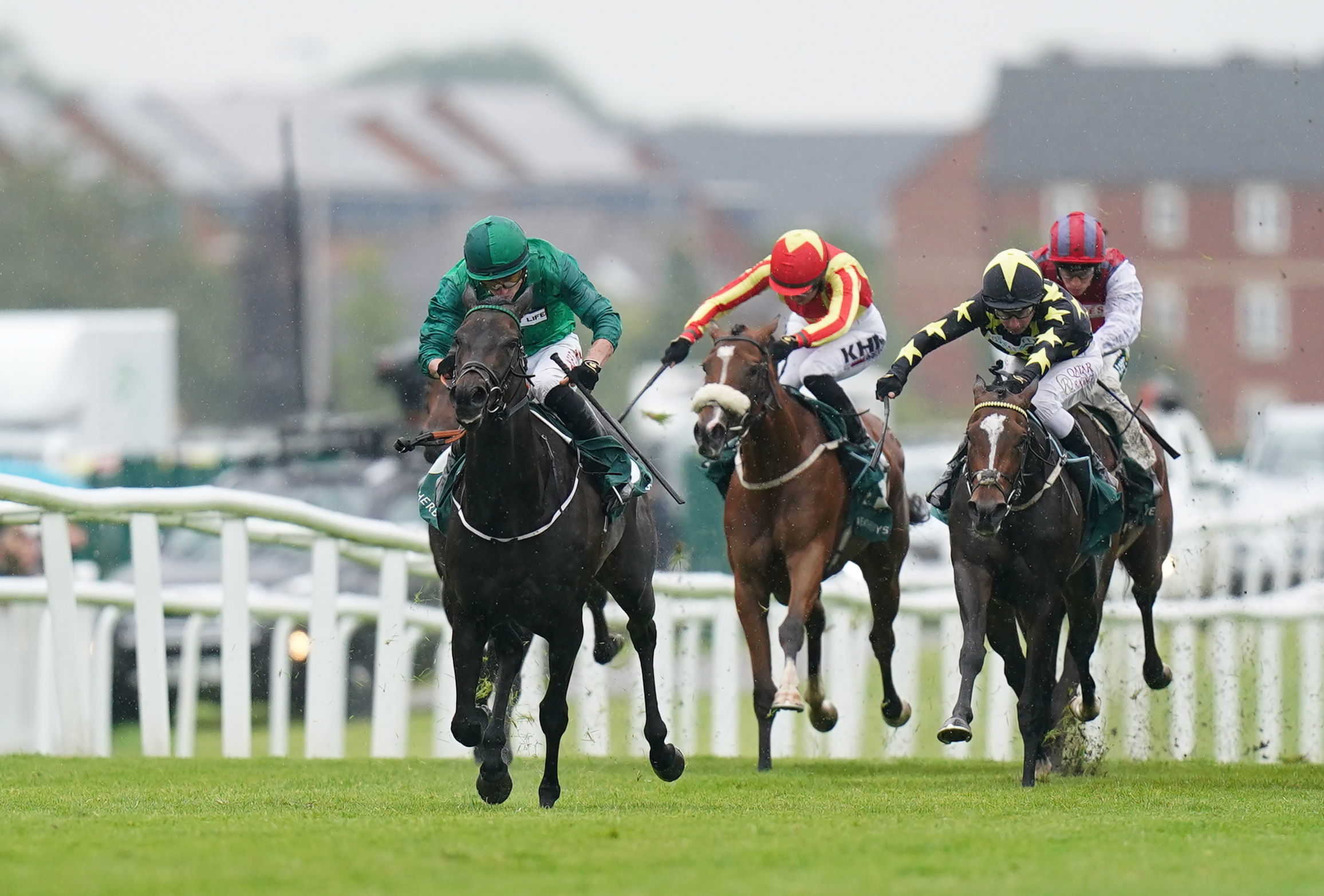 Relief Rally (left) wins the Weatherbys Super Sprint at Newbury
