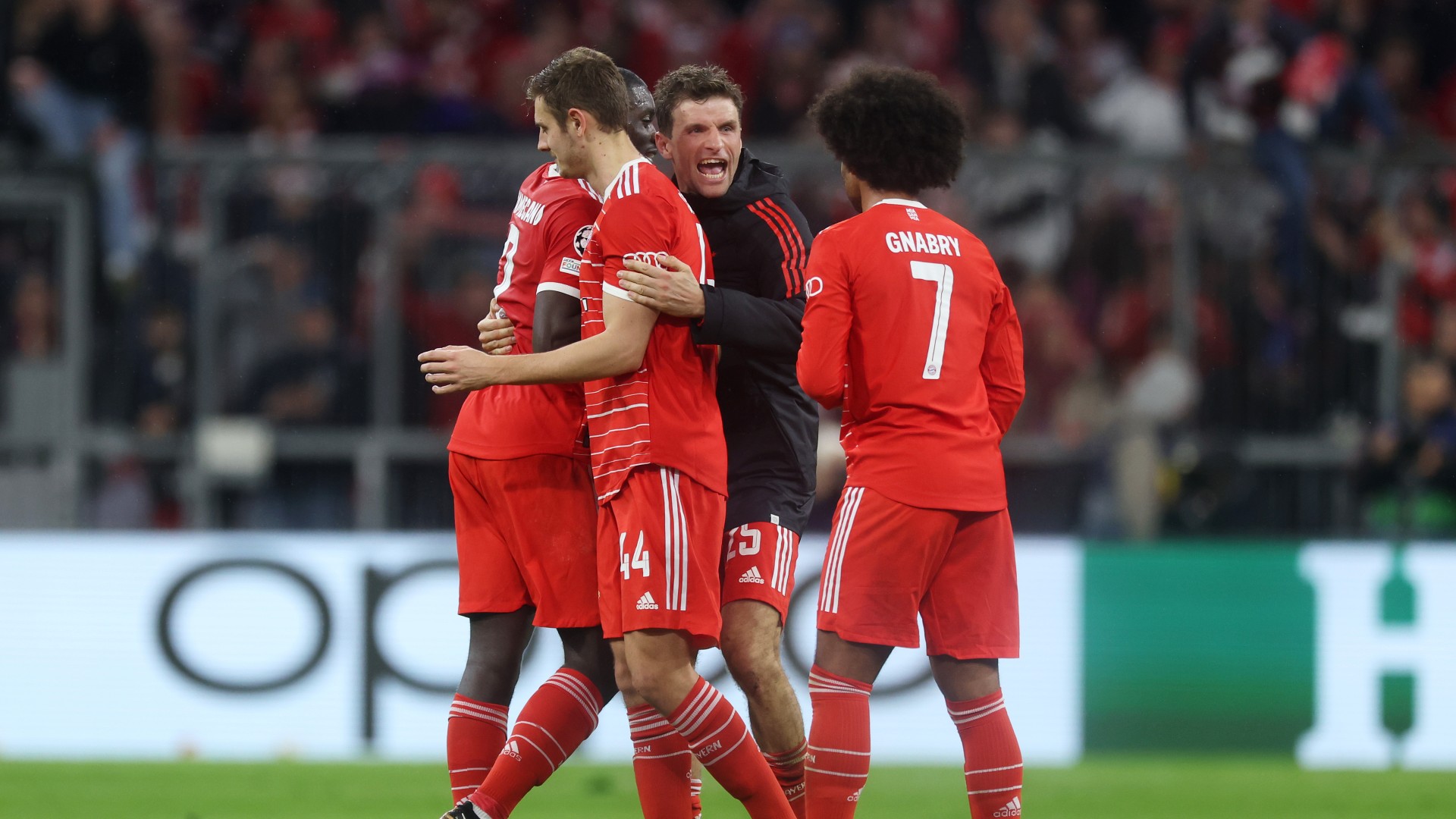 Thomas Muller celebrates with Bayern Munich team-mates after victory over Paris Saint-Germain