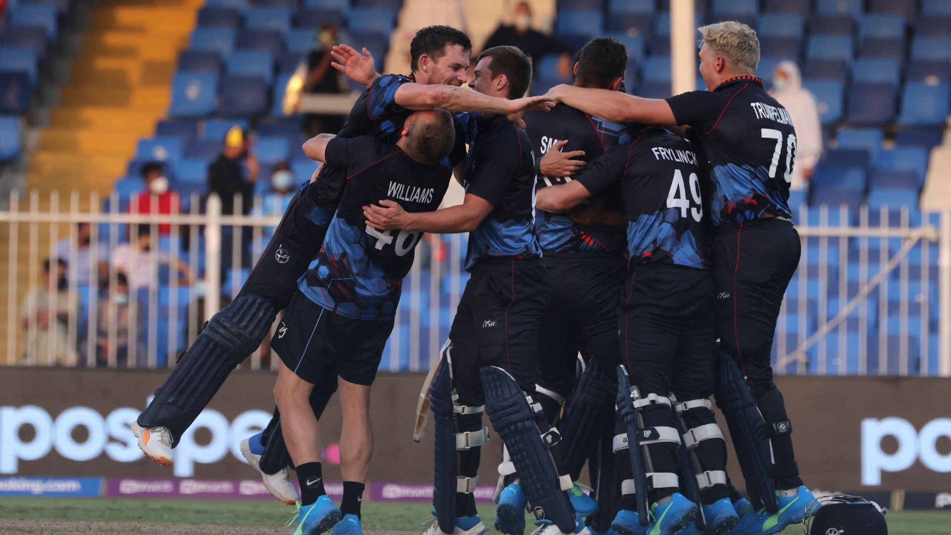 Namibia players celebrate their victory over Ireland