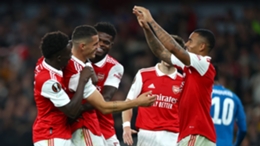 Granit Xhaka is mobbed by his Arsenal team-mates after scoring against PSV