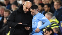 Phil Foden gets his instructions from Pep Guardiola