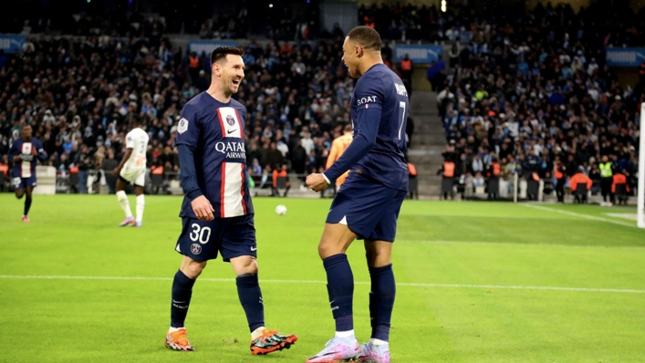Lionel Messi (L) and Kylian Mbappe (R) celebrate a goal against Marseille