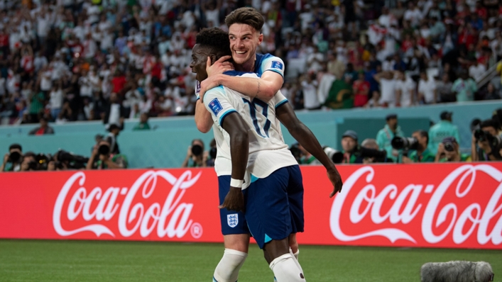 Declan Rice celebrates with Bukayo Saka following the latter's goal in England's World Cup win against Iran
