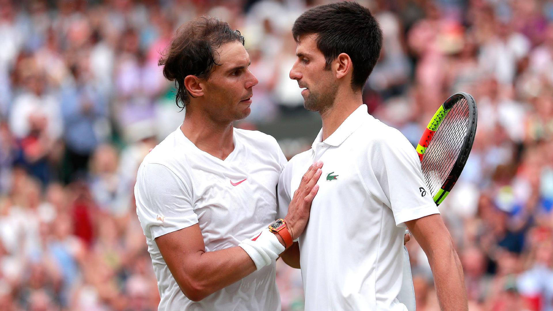 Novak Djokovic, right, is feeling the absence of his rival Rafael Nadal in Paris (Andrew Couldridge/PA)
