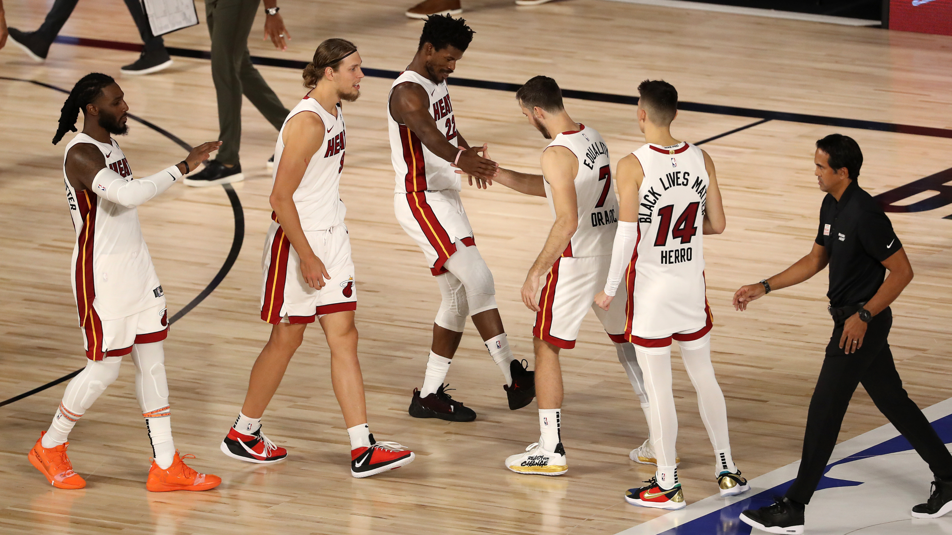 Heat take 2-0 lead over Bucks in controversial finish, Rockets advance
