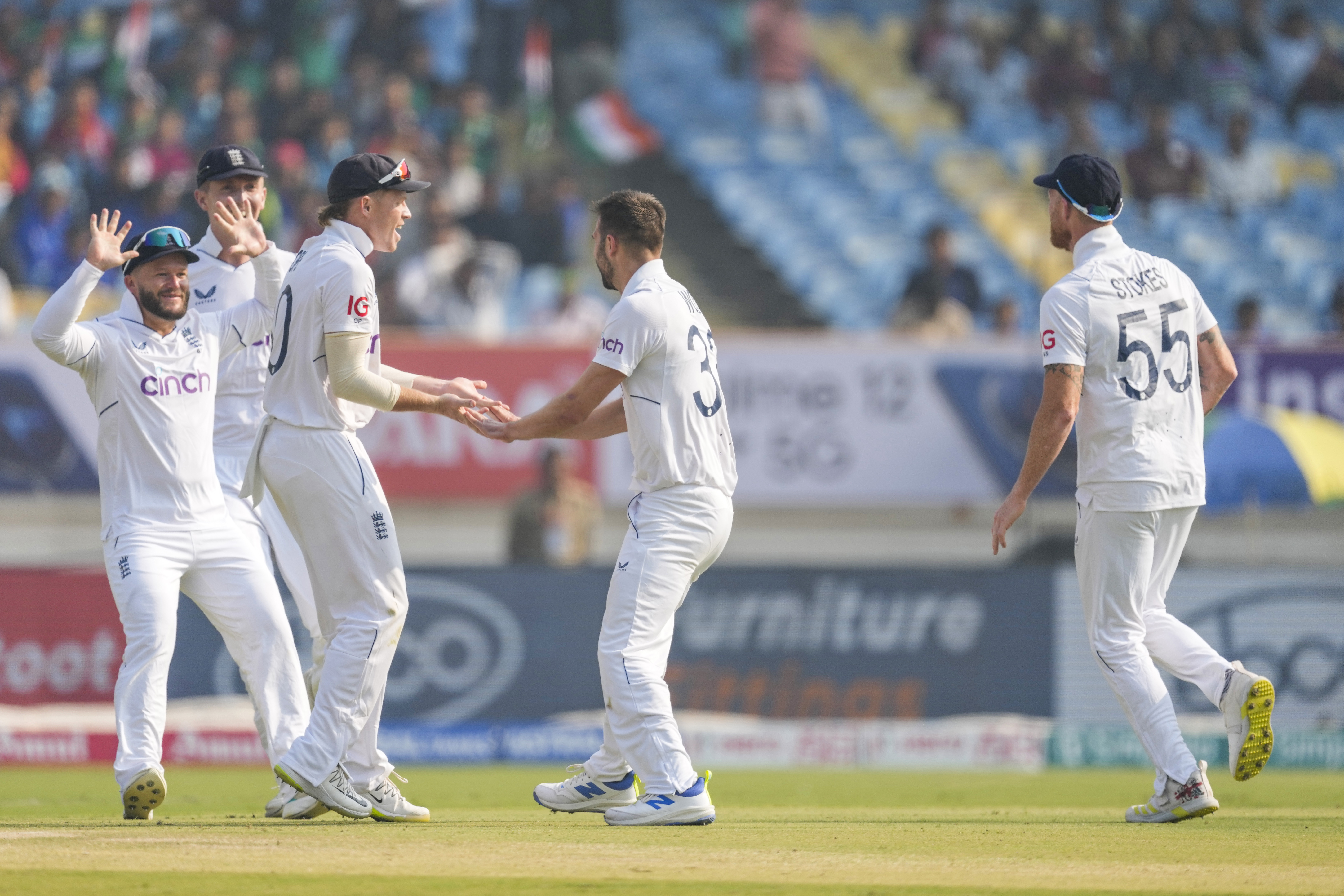 England celebrate a wicket