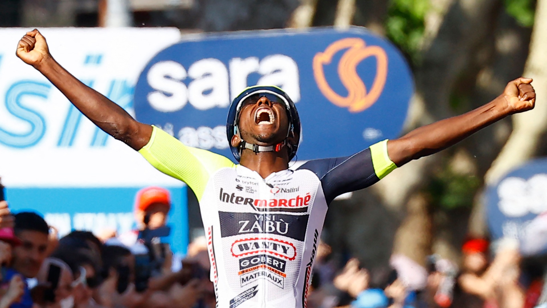 Biniam Girmay celebrates his historic win
