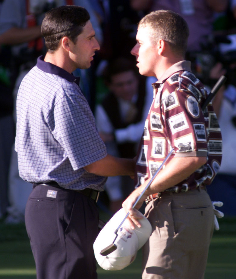 Justin Leonard, right, shakes hands with Jose Maria Olazabal after his controversial singles win in 1999