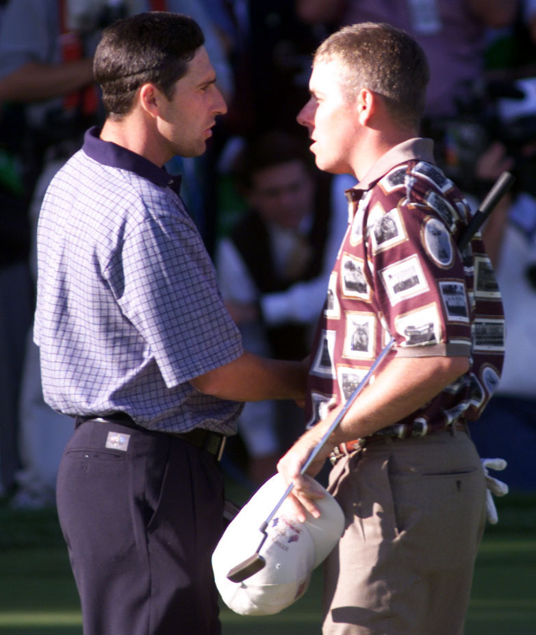 Justin Leonard, right, shakes hands with Jose Maria Olazabal after his controversial singles win in 1999