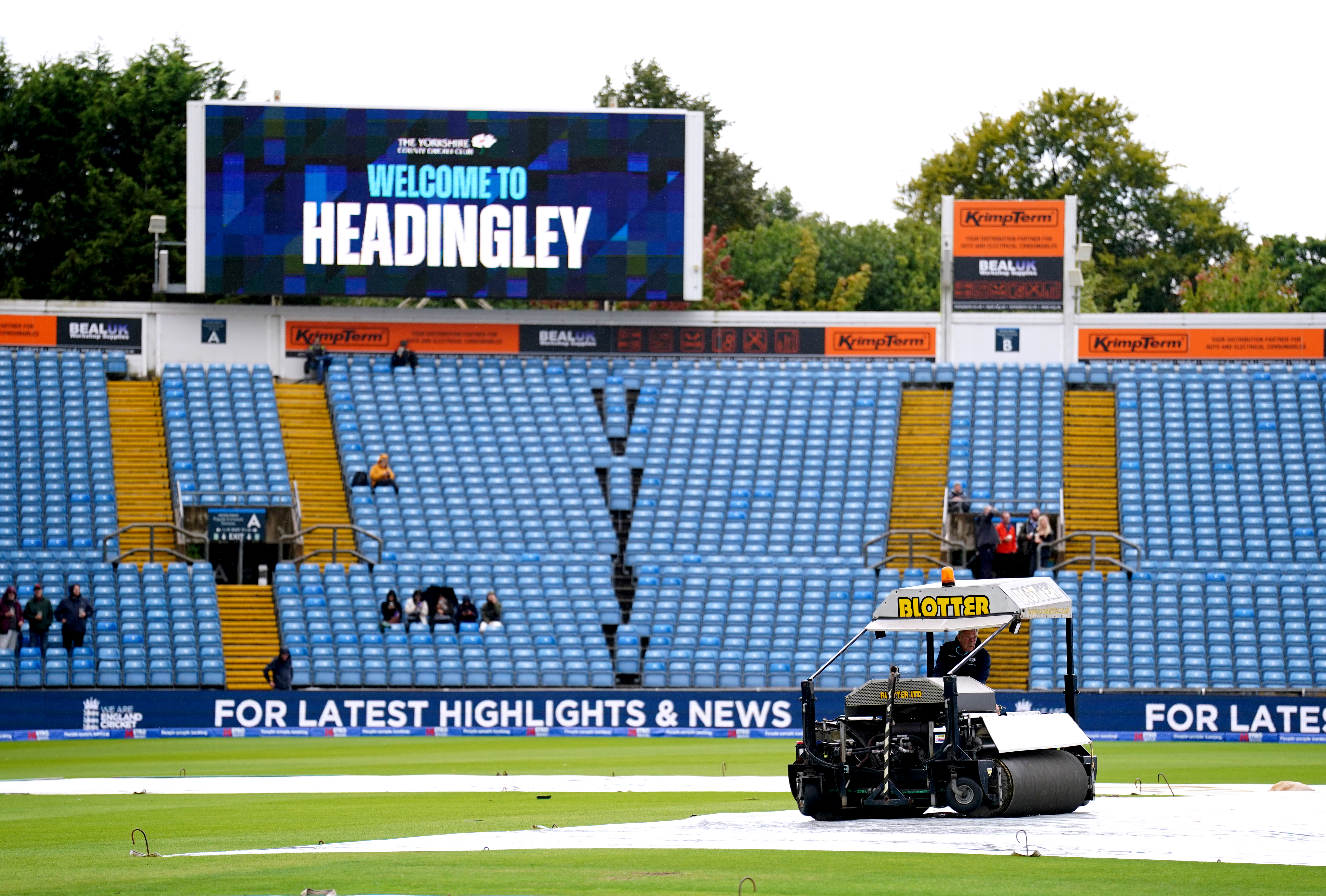 A blotter removes water from the covers at Headingley
