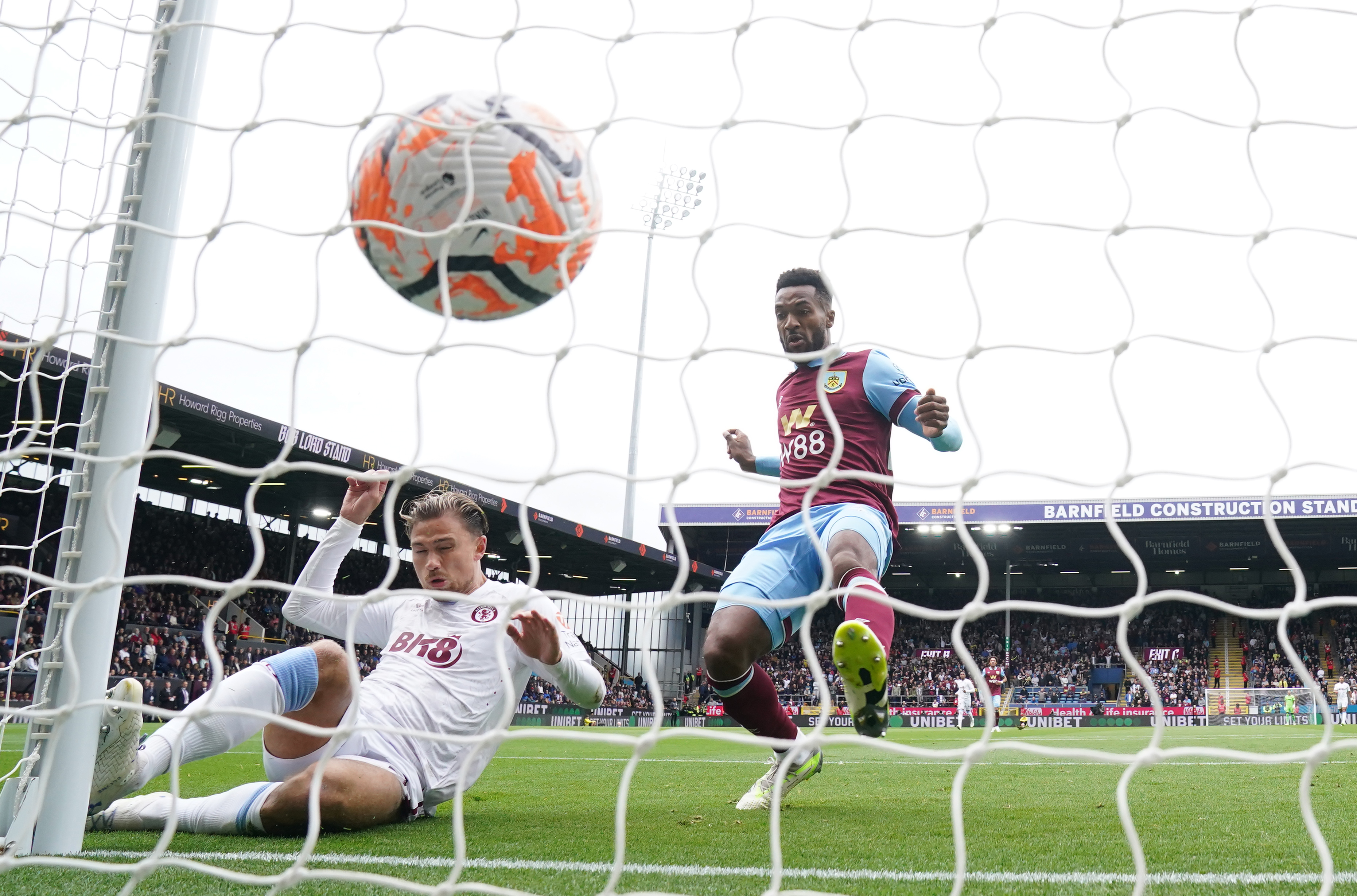 Cash slides in to open the scoring for Villa at Turf Moor