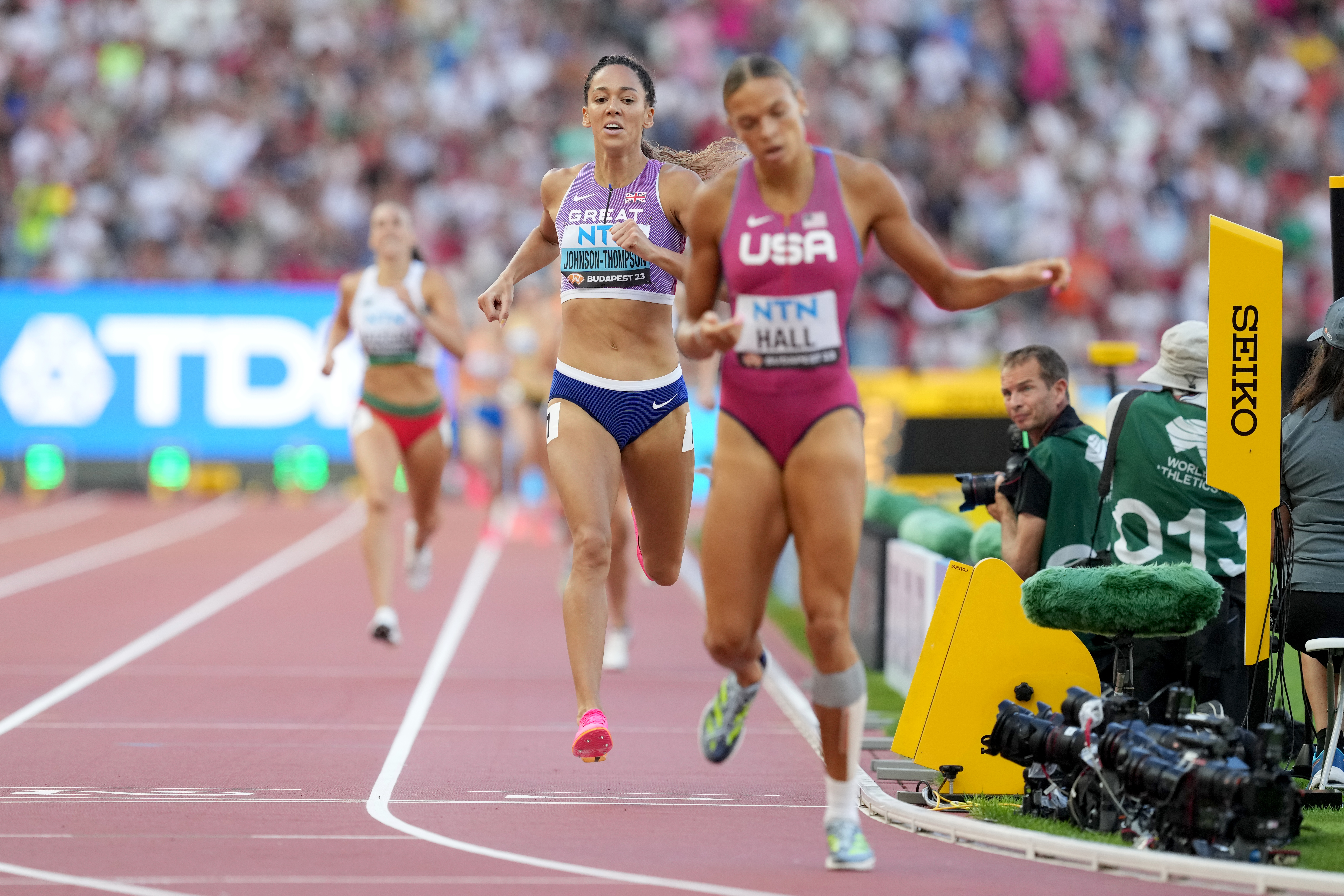 Katarina Johnson-Thompson crosses the line in second to win gold