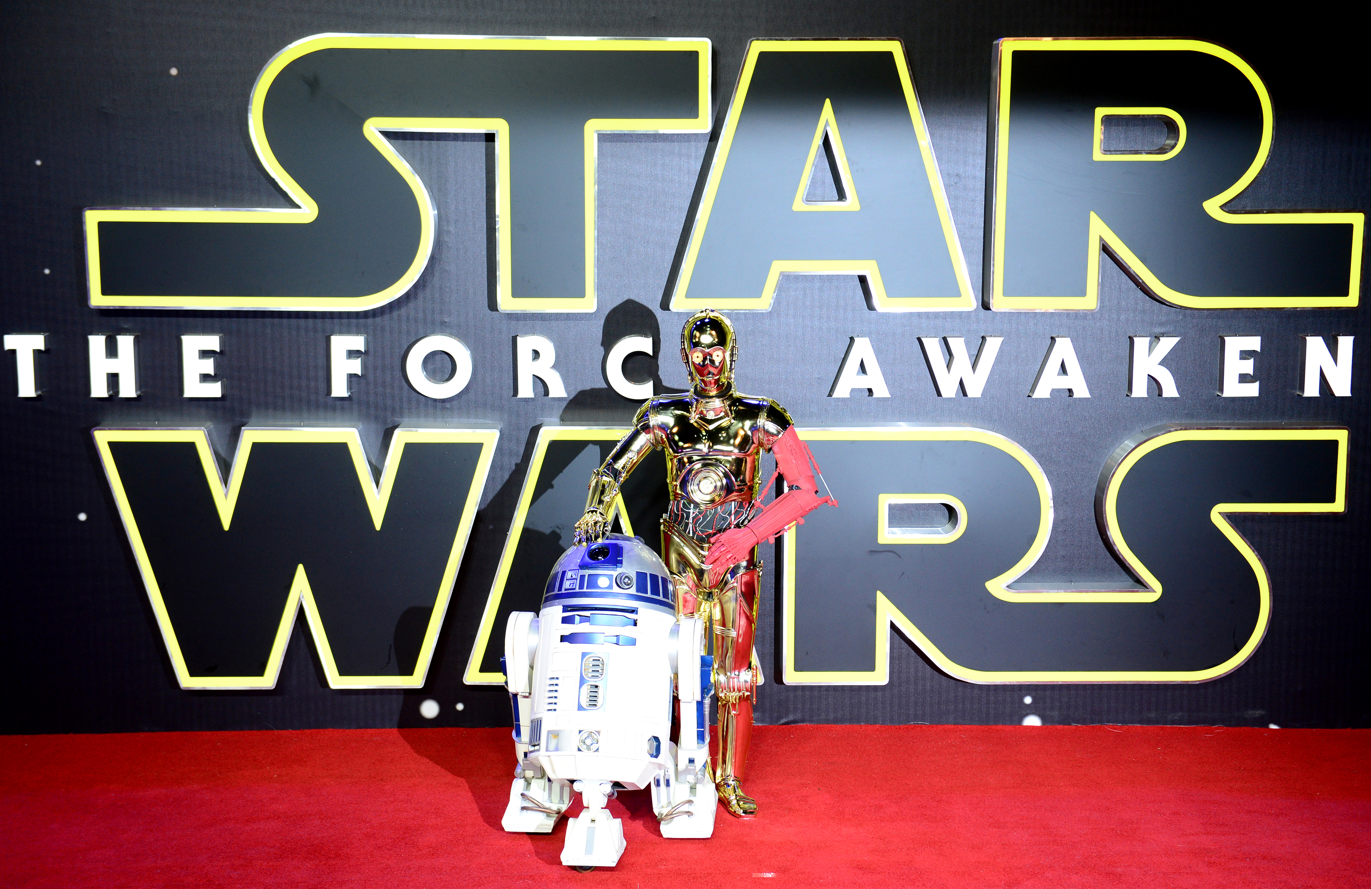 C-3PO and R2-D2 robots on the red carpet during the Star Wars: The Force Awakens European Premiere in Leicester Square, London (Anthony Devlin/PA)