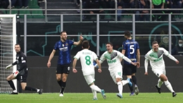 Sassuolo players celebrate after scoring against Inter on Sunday