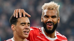 Jamal Musiala celebrates with Eric Maxim Choupo-Moting after teeing up the striker's goal against Schalke